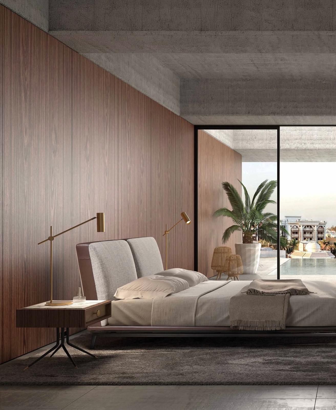 Hotelkamer met een houten wand en een bed van Martinez Cardona